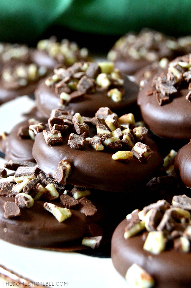 closeup stack of no-bake thin mints on white plate with green fabric