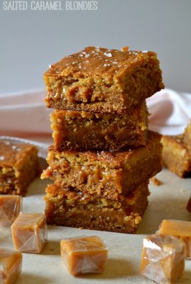 These Salted Caramel Blondies are addictive, sweet and salty and so simple! Soft and chewy with a gooey caramel filling, they're finished with an irresistible flaky sea salt crunch.