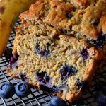 This Blueberry Banana Bread is the BEST banana bread recipe EVER! With a secret ingredient that makes it SUPER moist, tender, soft and extra banana-flavored. This bread is easy, addictive and amazing!