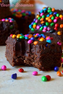 These Copycat Cosmic Brownies are the BEST EVER! Super fudgy, chewy and gooey with a rich chocolate flavor and an addictive chocolate ganache frosting! Tastes like childhood but BETTER and they're so easy to make!