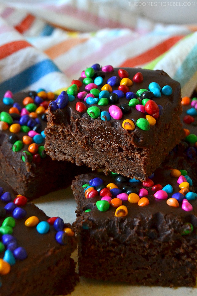 copycat cosmic brownies in a pile with rainbow fabric in background