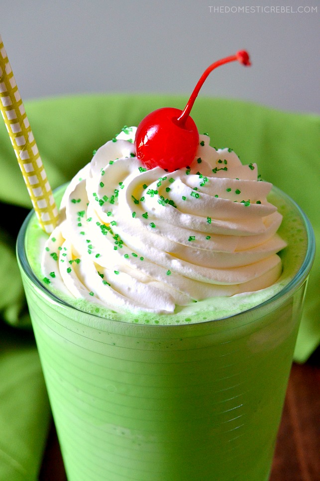 shamrock shake in glass with straw and cherry