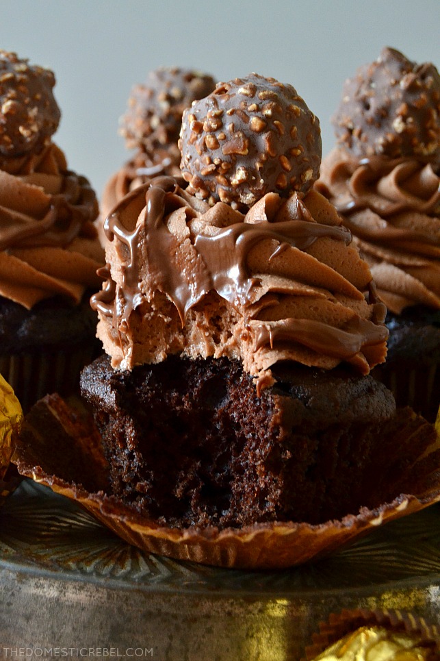 These Nutella Ferrero Rocher Cupcakes are ultra rich, super fudgy, moist, chocolaty and so delicious! The Nutella buttercream frosting is to die for! Such an easy and impressive cupcake!