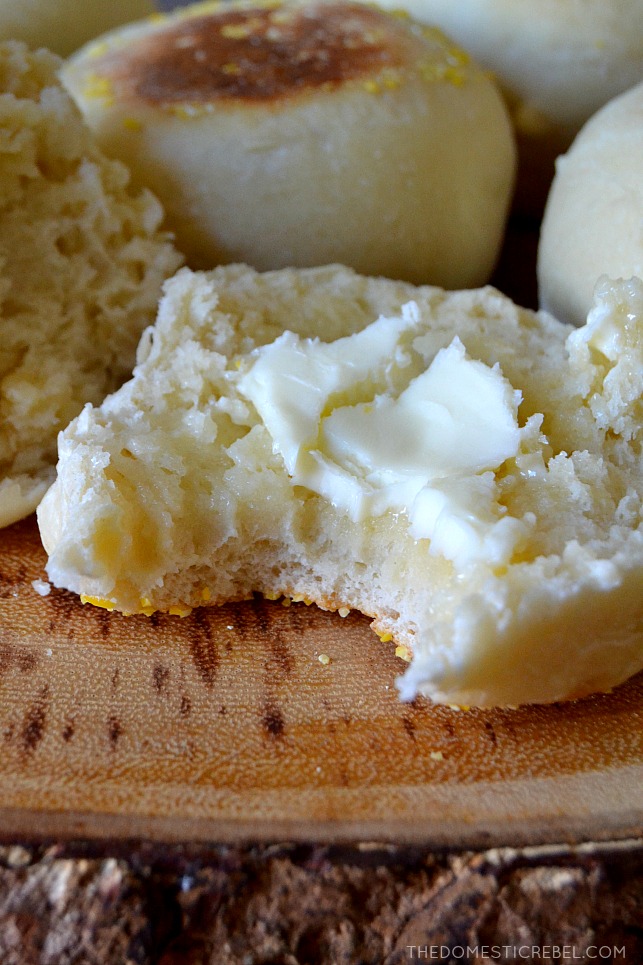 closeup of english muffin with butter and a bite missing