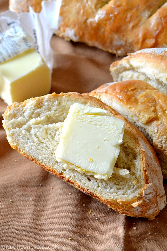 french bread slice with pat of butter