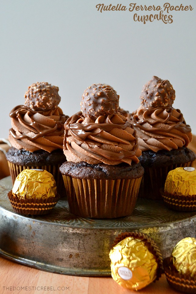 nutella ferrero rocher cupcakes arranged on metal tin with candies