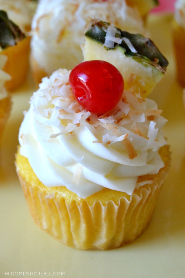 These Pina Colada Cupcakes taste like a tropical vacation in one moist and flavorful cupcake! Juicy pineapple cupcakes and a creamy and decadent coconut buttercream complete these vacation-inspired treats! 