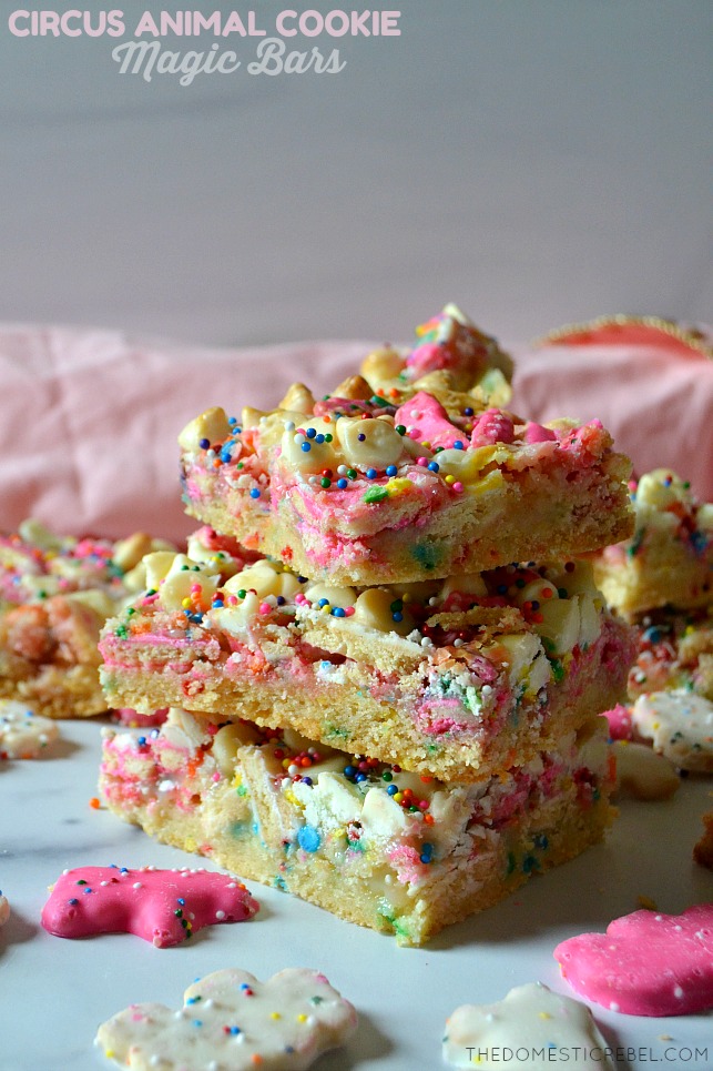 circus animal cookie magic bars stacked on white marble with cookies