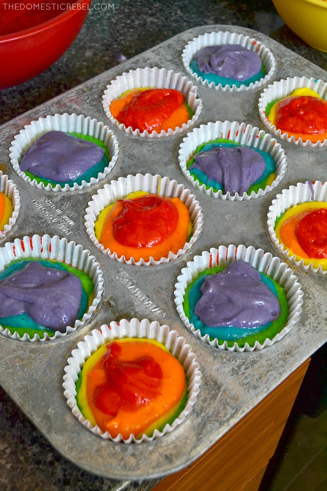 Photo of rainbow cupcake batter in muffin tin