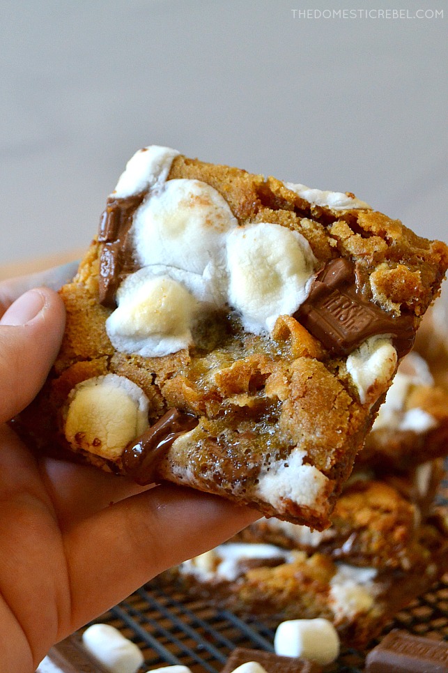 author holding a s'mores cookie bar