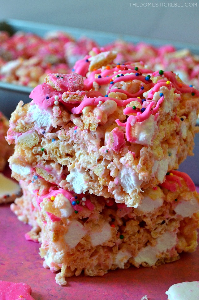 closeup stack of circus animal cookie rice krispy treats stacked on pink background