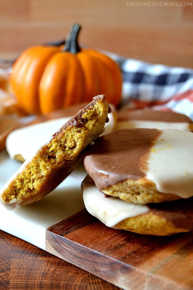 Small stack and arrangement of pumpkin black and white cookies with a pumpkin