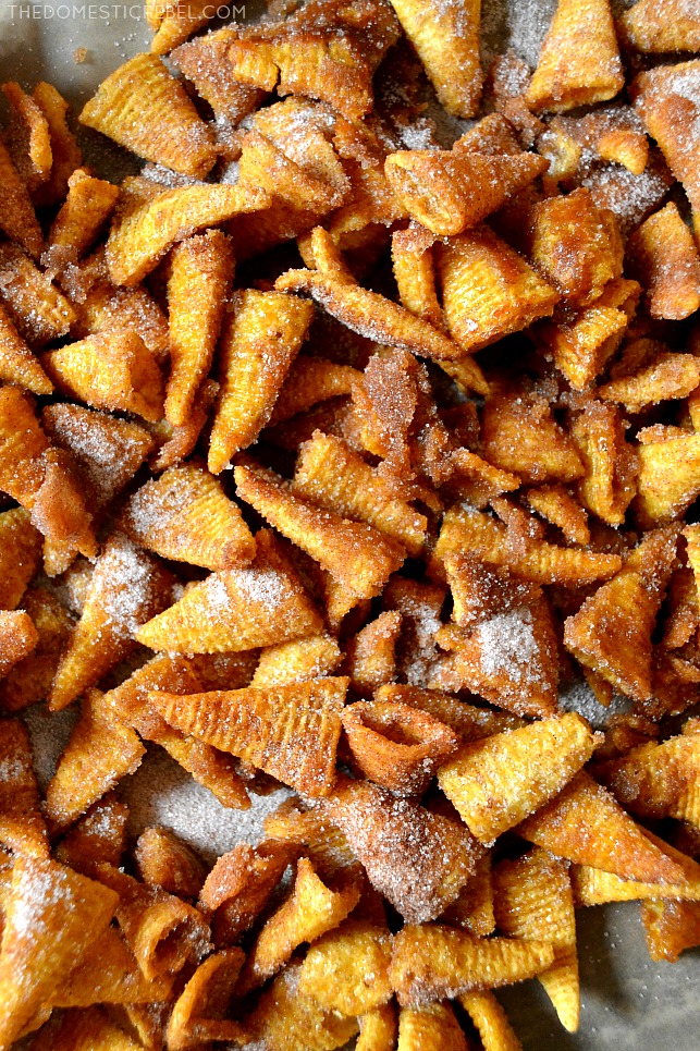 Arrangement of Churro Bugle Snack Mix in a pile on a baking sheet