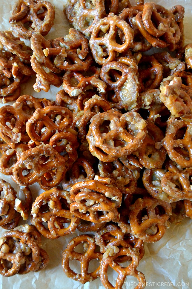 Butter toffee pretzels scattered on brown parchment