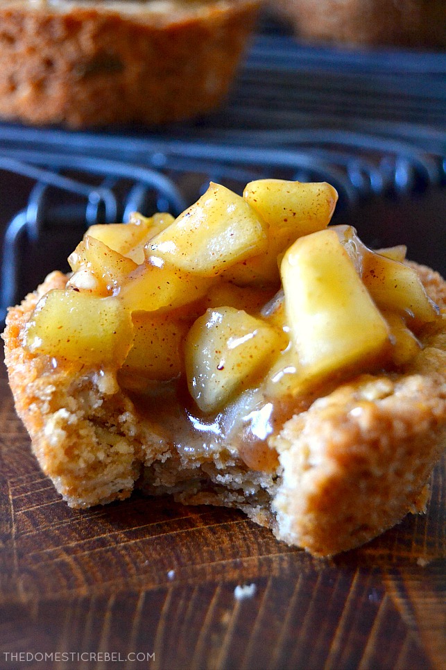 Closeup shot of apple crisp cookie cup with a bite missing