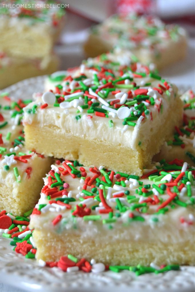 Stack of Christmas Sugar Cookie Bars on a white plate