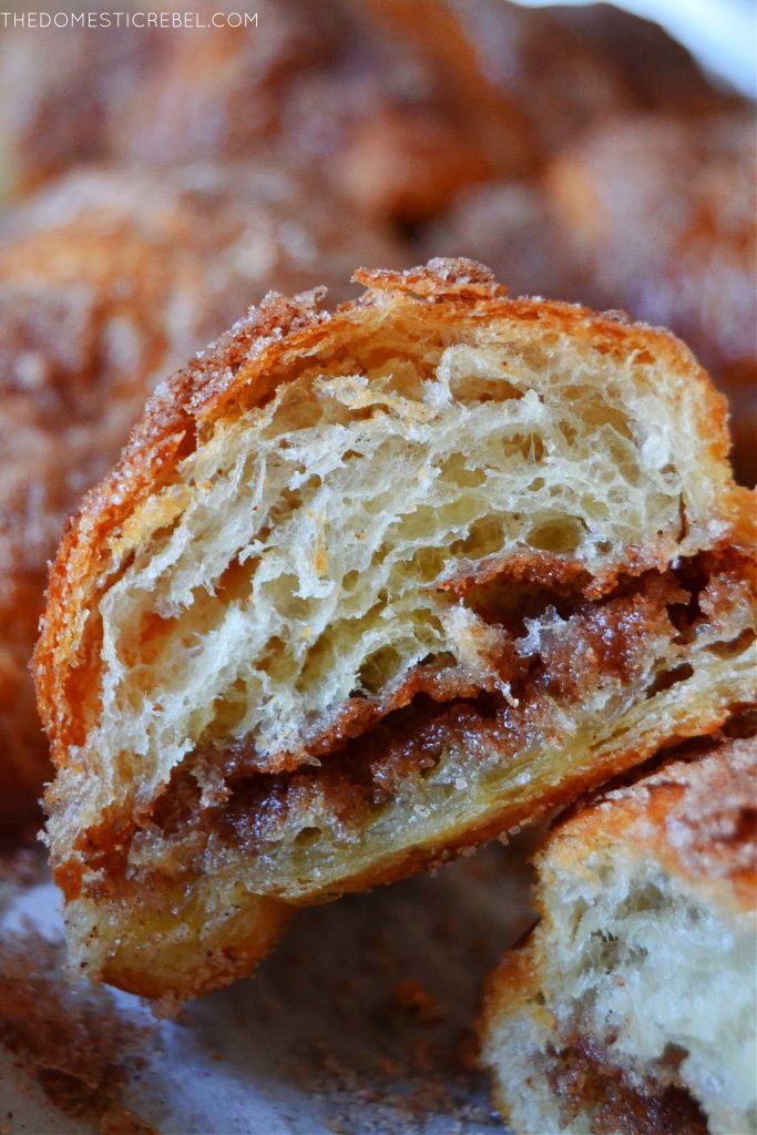 Closeup of a split open churro croissant