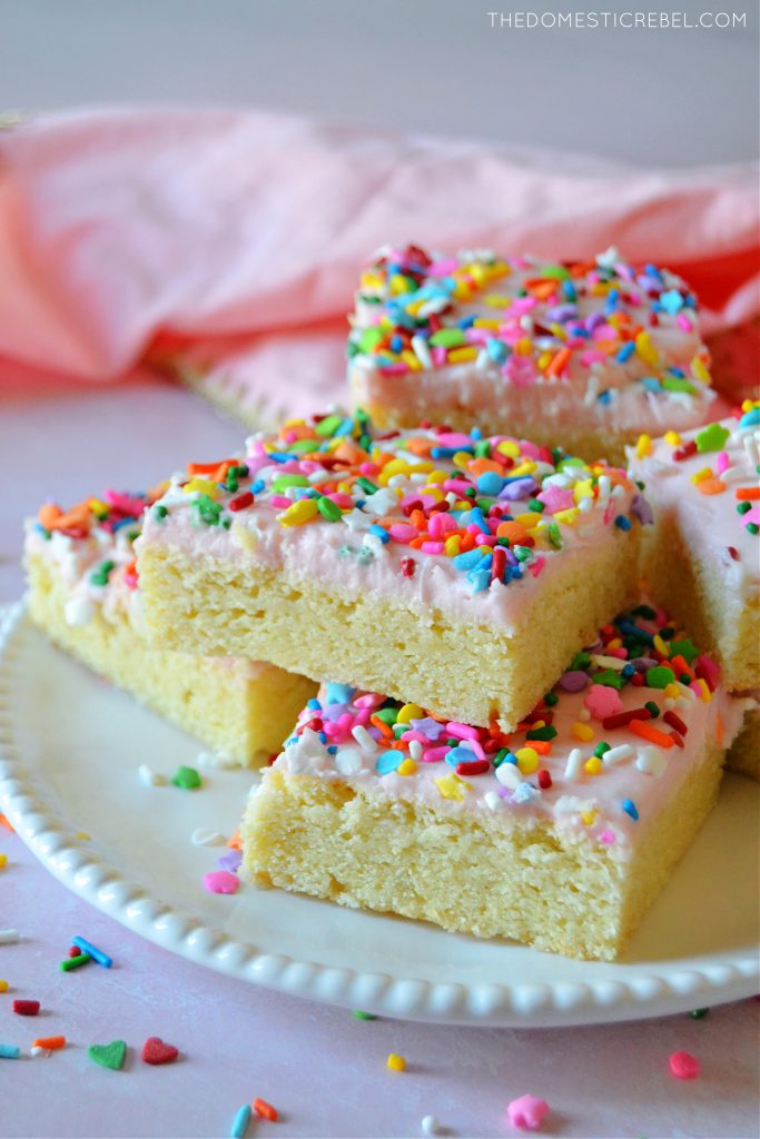 Stack of sugar cookie bars on a white plate