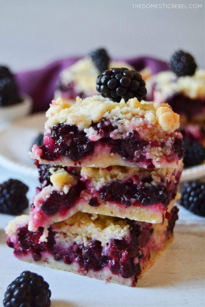 a trio stack of blackberry crumble bars