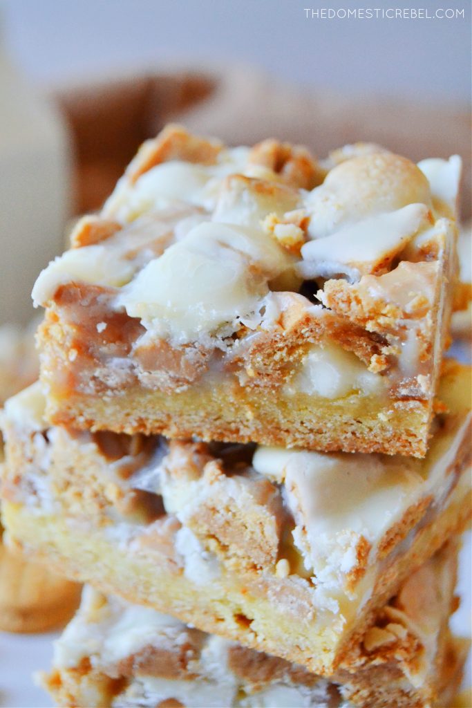 close up stack of white chocolate nutter butter magic bars