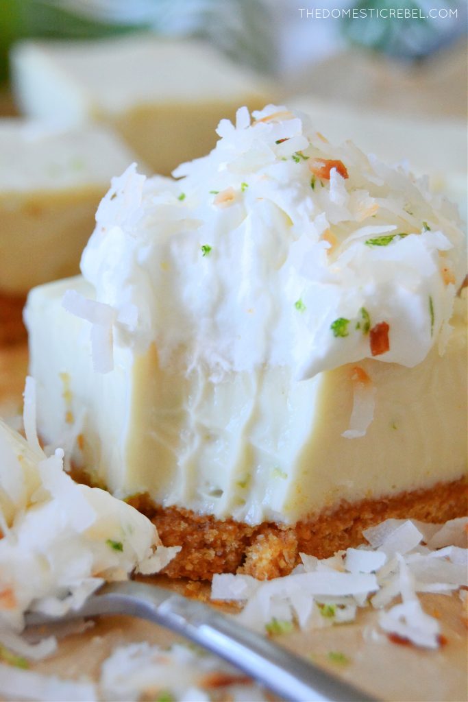 closeup of key lime pie bar with bite missing
