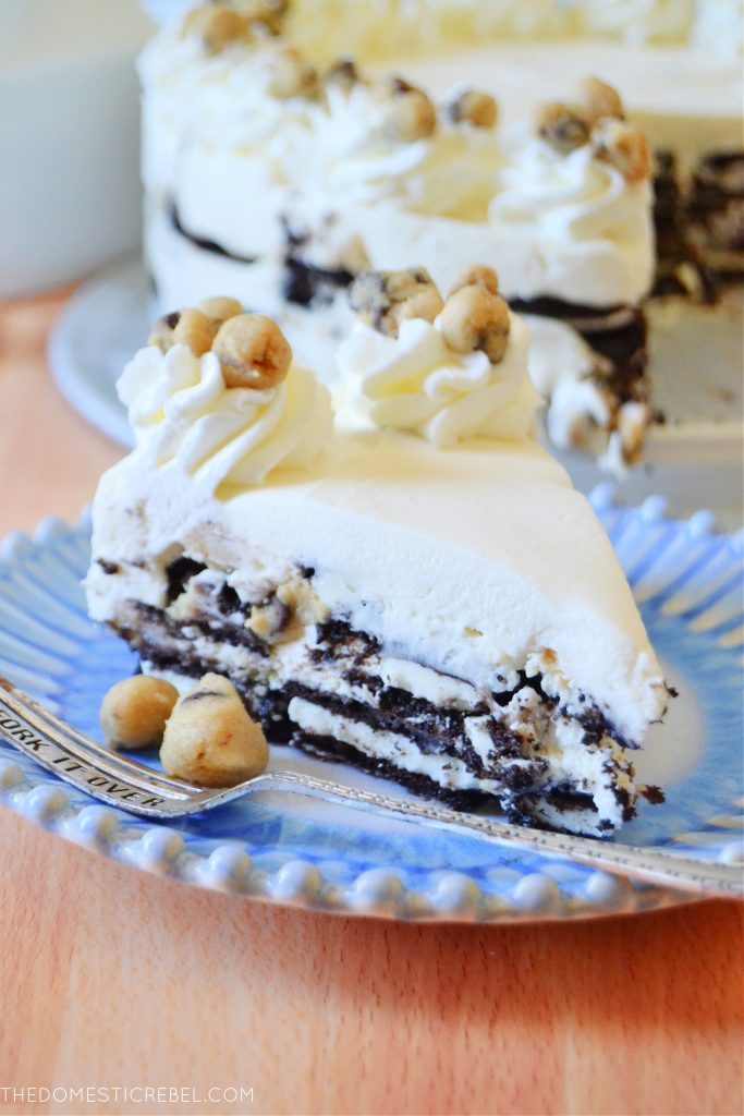 cookie dough oreo icebox cake on a blue and white plate with a fork