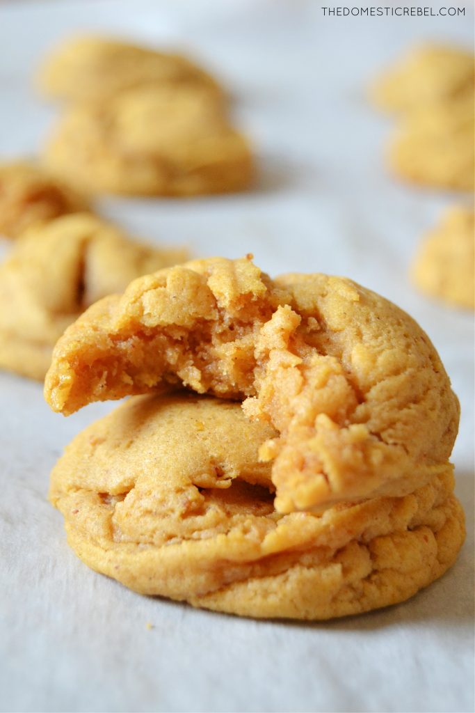 a bitten brown butter pumpkin spice cookie stacked on another one