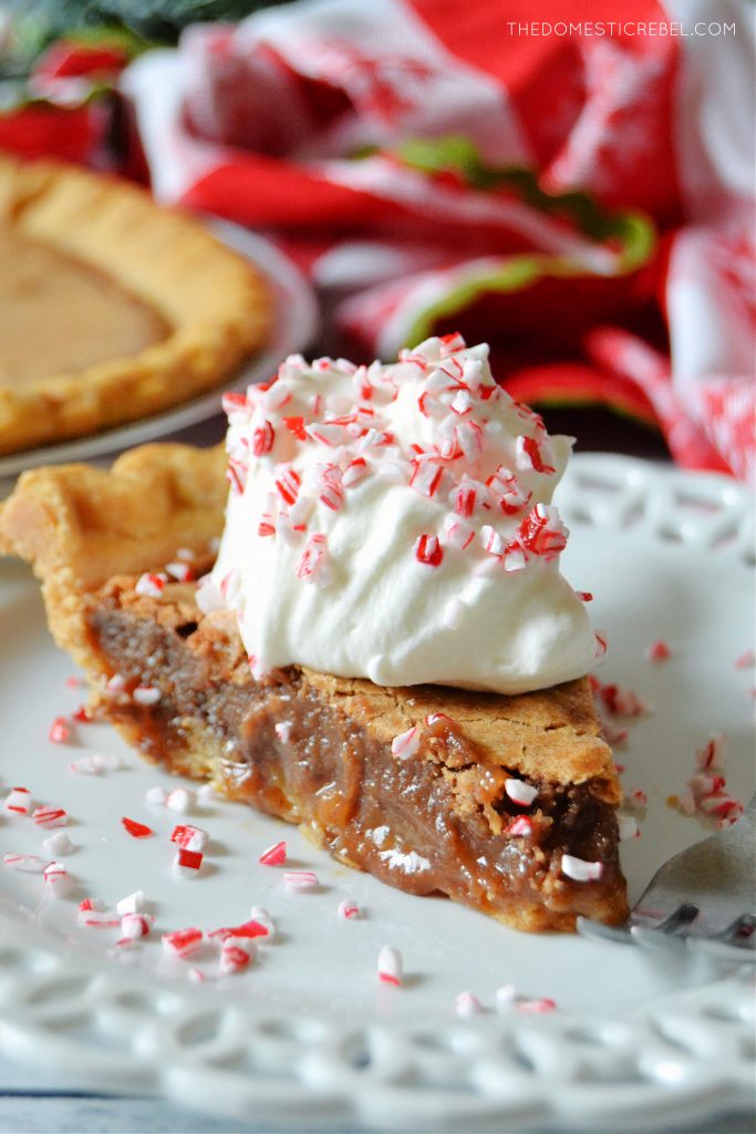 closeup photo of a slice of chocolate peppermint chess pie on a white lace plate