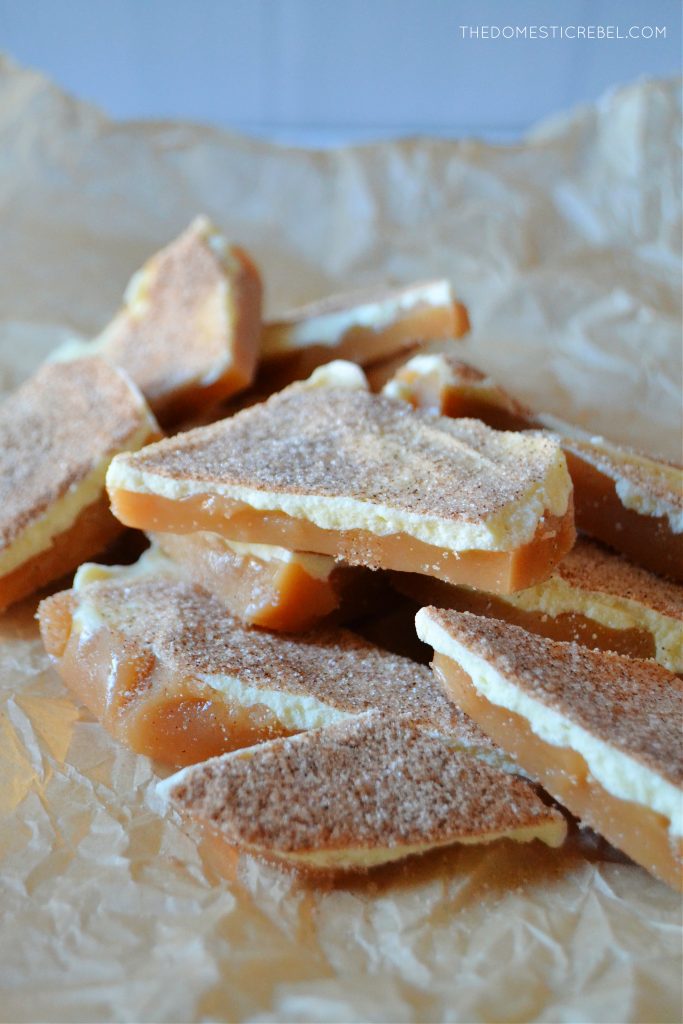 a pile of churro toffee pieces on parchment paper