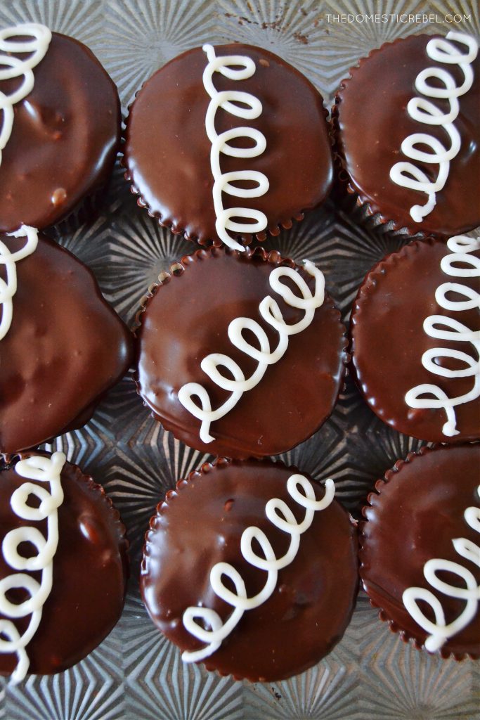 a grid pattern of 9 hostess homemade cupcakes on a patterned baking sheet