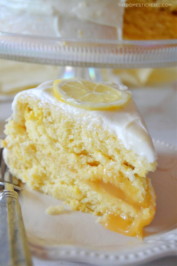 lemon layer cake slice on a white plate
