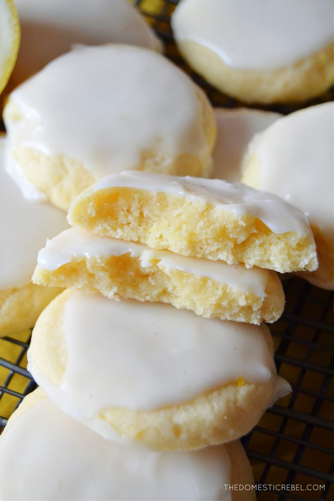 a closeup of lemon meltaway cookies nestled on top of one another in a pile.