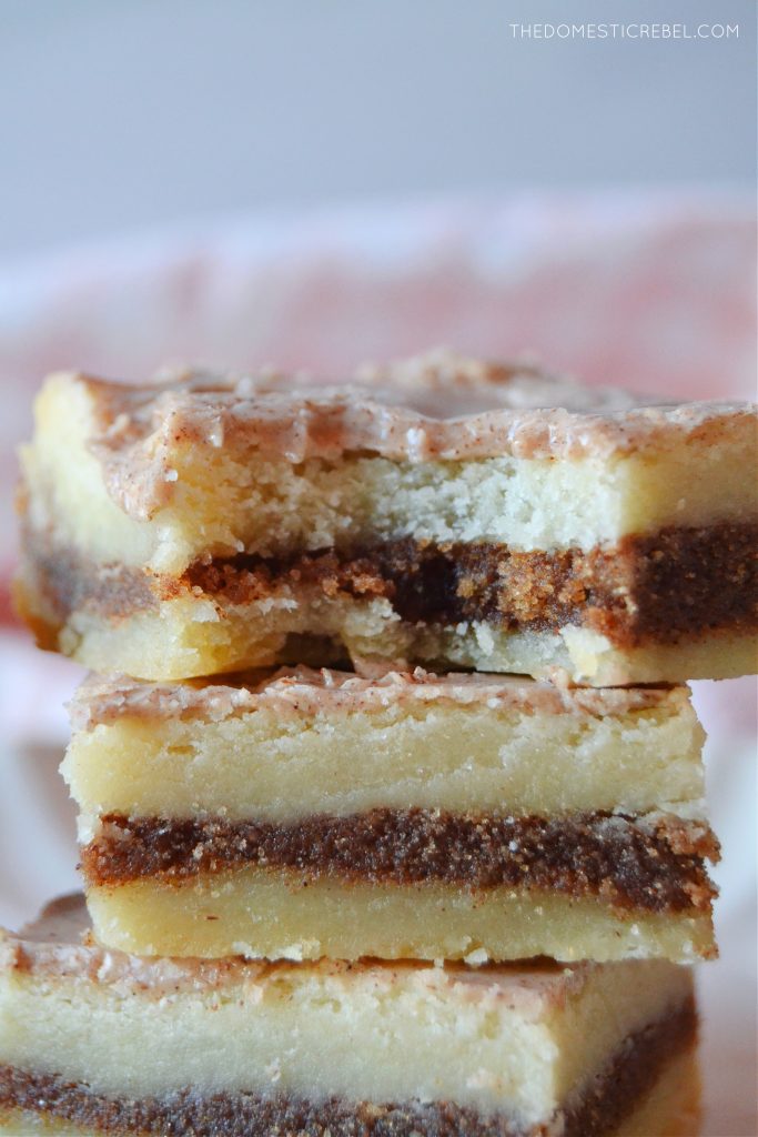 close-up shot of a stack of pop tart bars. the top bar on the stack has a bite missing from it.